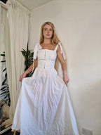 White Dobby spot skirt, recommend adding a petticoat as it's sheer (sample UK 6/8)