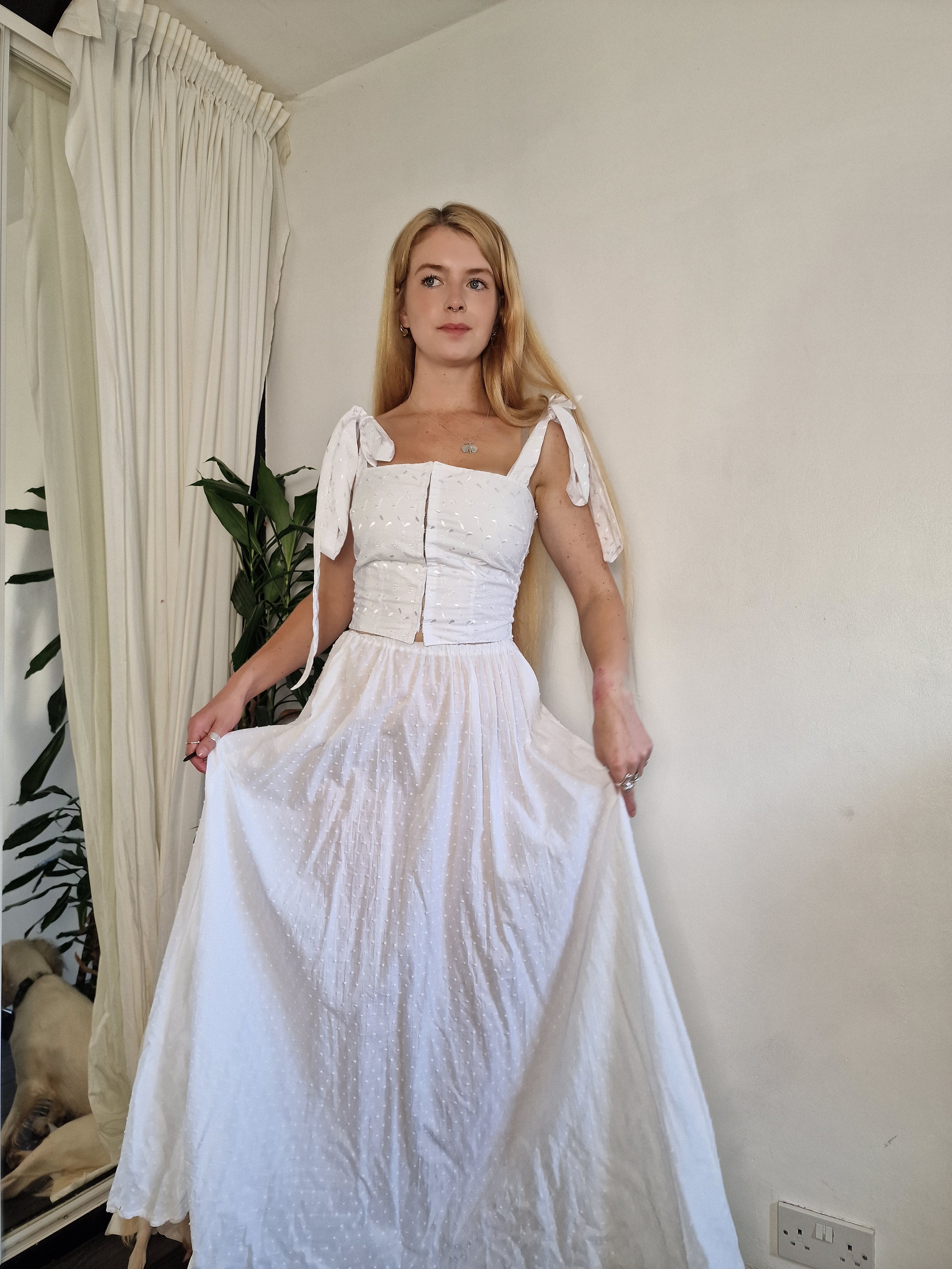 White Dobby spot skirt, recommend adding a petticoat as it's sheer (sample UK 6/8)